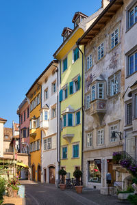 Residential buildings against blue sky