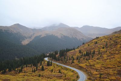 Scenic view of landscape and mountains against sky