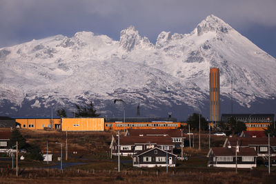 Snowcapped mountains against sky during winter