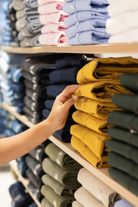 Midsection of woman standing in store