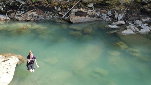 Woman standing in water