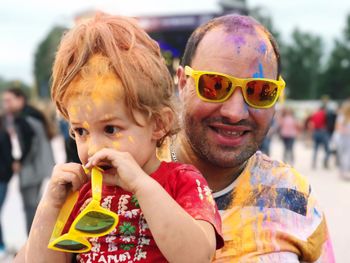 Portrait of smiling father with daughter 