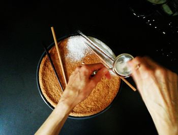 Close-up of hand holding drink