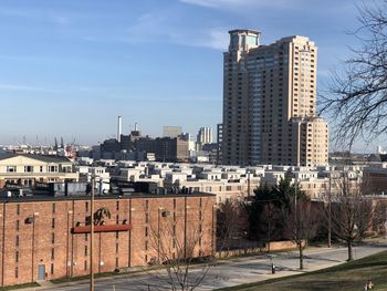 Buildings in city against sky