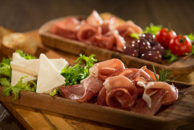 Close-up of served food on cutting board