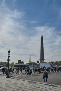 People in city against clear sky