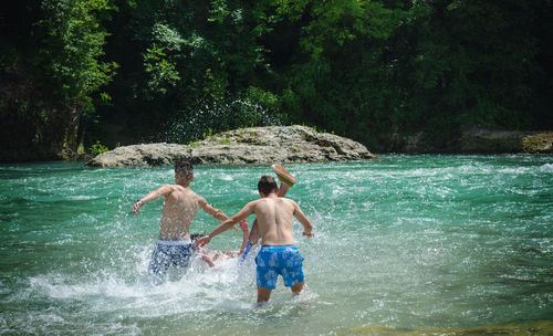 Boy playing in water