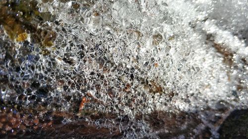 Full frame shot of rocks in water