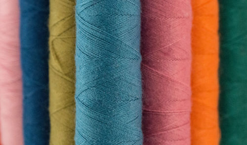 Full frame shot of colorful thread spools