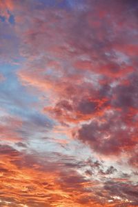 Low angle view of dramatic sky during sunset