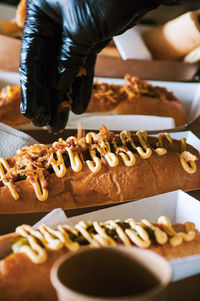 Freshly prepared hotdogs in a paper box. food delivery concept.