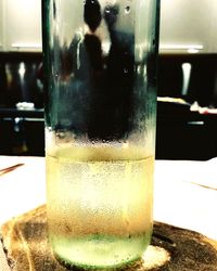 Close-up of beer glass on table