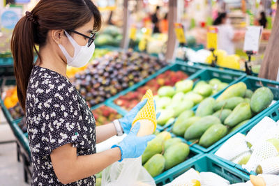 Woman standing in market