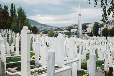 Panoramic view of cemetery against sky