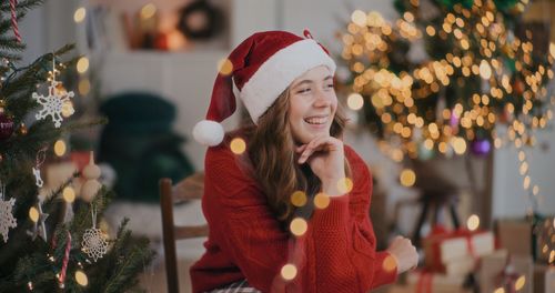 Woman wnjoying christmas xmas decorations