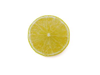Close-up of lemon slice against white background