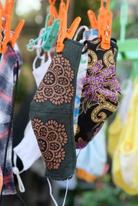 Low section of clothes hanging at market stall