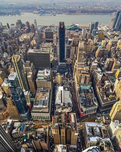 High angle view of cityscape against river