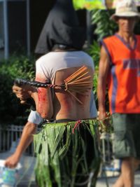 Close-up of young woman holding hands