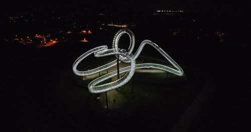 Close-up of illuminated lighting equipment at night