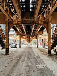 Underneath view of bridge in city