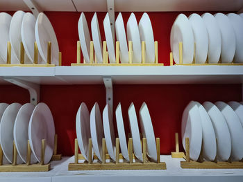 Set of white dishes shelf for sale at retail store