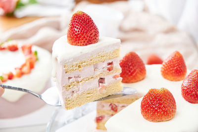 Close-up of strawberries on ice cream