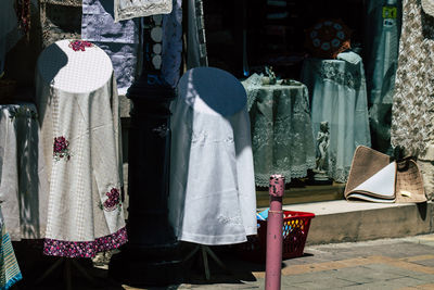 Clothes hanging in store for sale