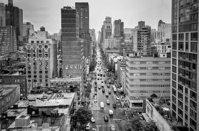 High angle view of street amidst buildings in city