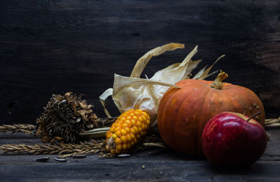 Close-up of pumpkins in basket on table