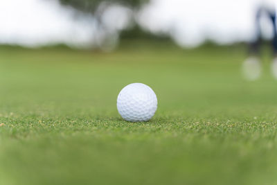 Close-up of ball on grassland