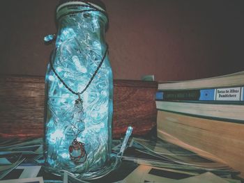 Close-up of water in jar on table
