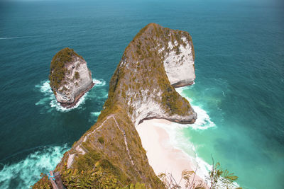 High angle view of rock formation in sea