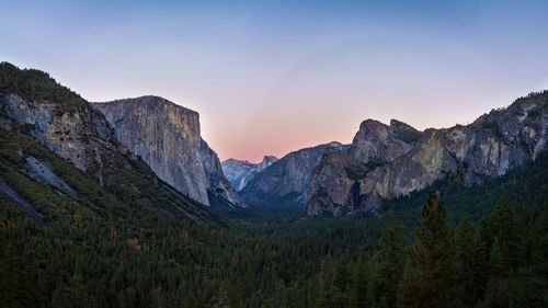 Scenic view of mountains against sky during sunset