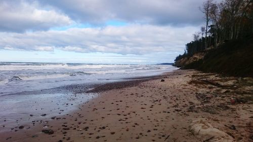 Scenic view of beach against sky