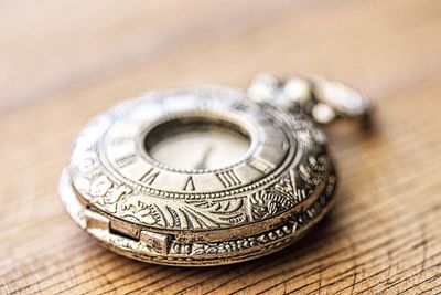 High angle view of coin on table