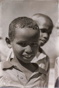 Close-up portrait of smiling boy