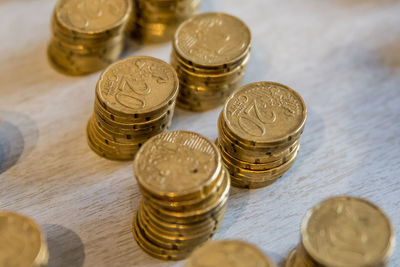 High angle view of coins on table