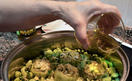 High angle view of person preparing food