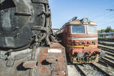 Train on railroad track against sky