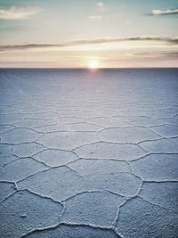 Scenic view of landscape against sky during sunset