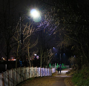 Illuminated street light at night