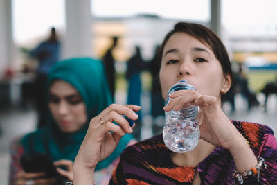 Close-up of a young woman eating