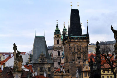 Statue of historic building against sky