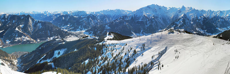 Sunny wide angle aerial panorama of skiing winter resort near zell am see snd kaprun in austria