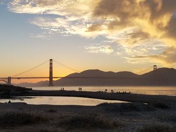 View of suspension bridge at sunset