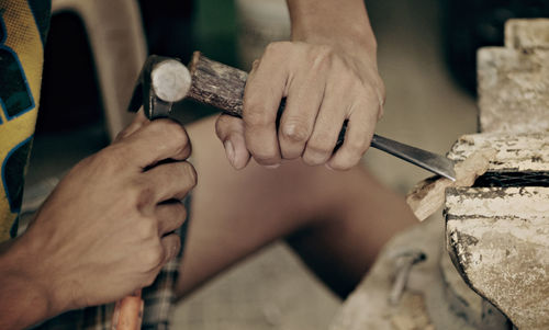 Close-up of woman holding hands