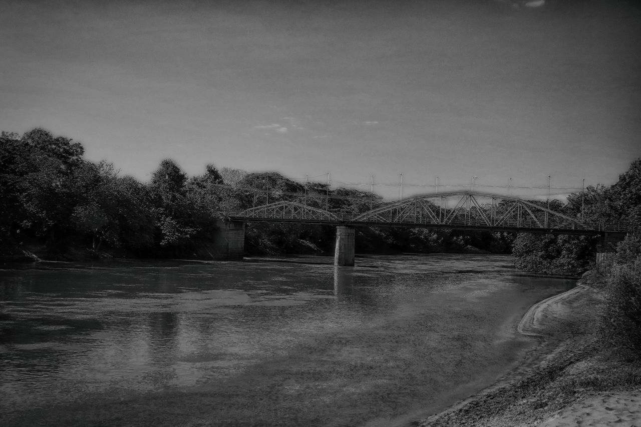 VIEW OF BRIDGE OVER RIVER AGAINST SKY