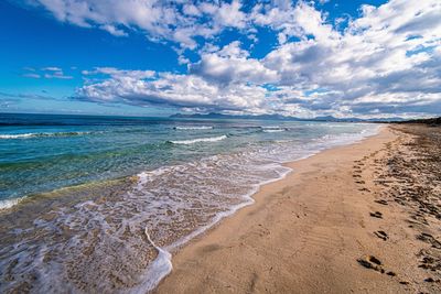 Scenic view of beach against sky