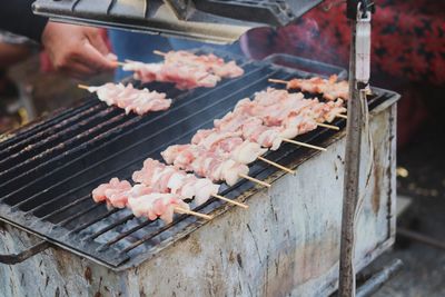 Close-up of meat on barbecue grill